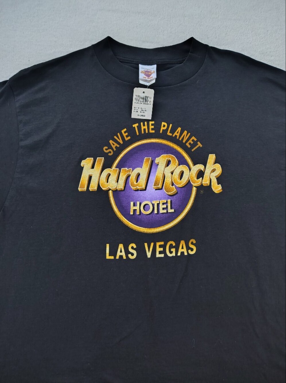 Hard Rock Cafe Black T-Shirt with Gold and Purple Logo